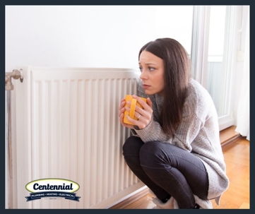 Woman next to furnace.
